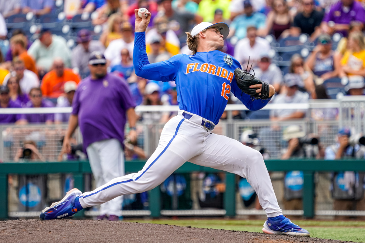 Jun 25, 2023; Omaha, NE, USA; Florida Gators starting pitcher Hurston Waldrep (12) throws a pitch against the LSU Tigers during the first inning at Charles Schwab Field Omaha. Mandatory Credit: Dylan Widger-USA TODAY Sports